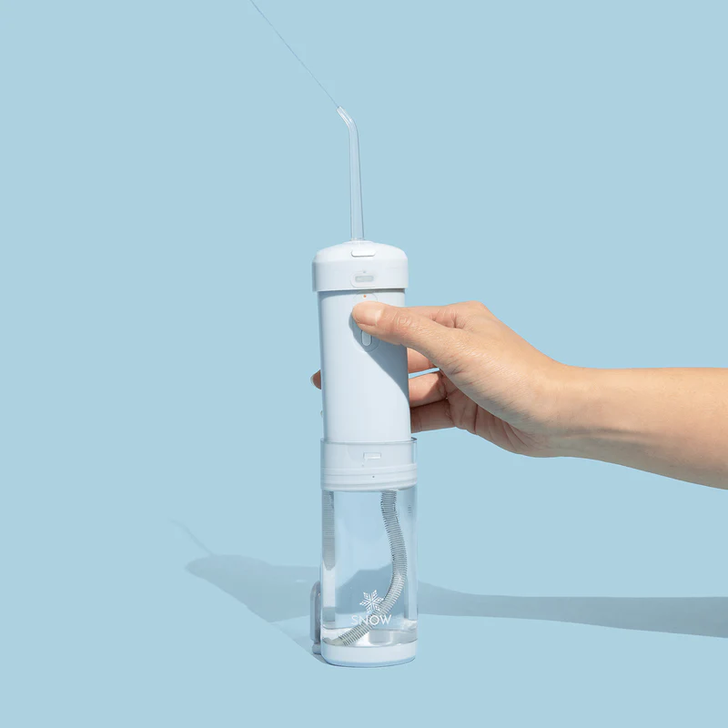 snow-teeth-whitening-the-water-flosser-4 Snow Teeth Whitening Water Flosser Hero