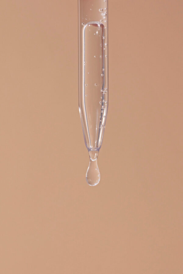 _I3A0346-Cropped OUAI hair care scalp serum pipette close up