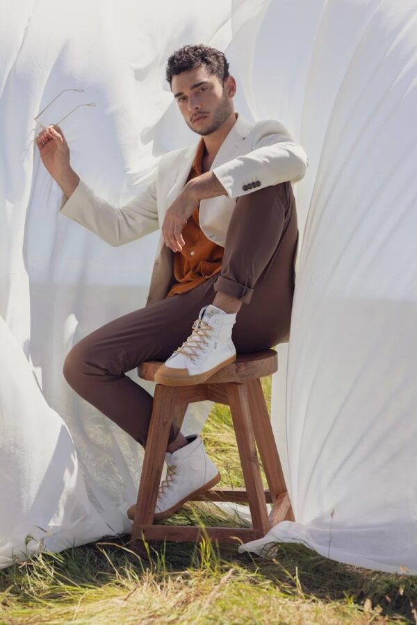fall fashion grounded people model sitting on chair