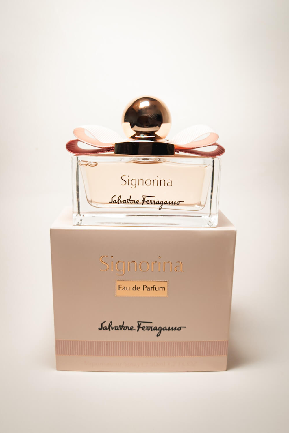 Luxury fragrance Signorina Eau de Parfum by Salvatore Ferragamo bottle on top of box Photo by Sophia Calderone