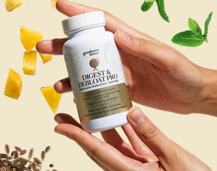 Image of hands holding Goodness Lover Digest & Debloat Pro dietary supplement